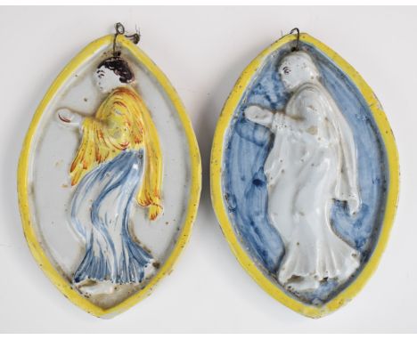 Pair of 19thC oval relief moulded plaques with figural decoration, in the style of Della Robbia, 17.5 x 11cm