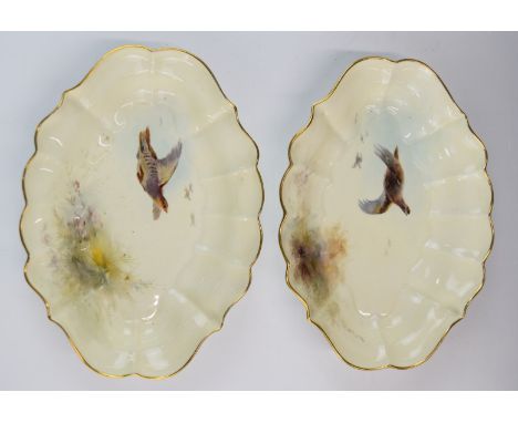 Royal Worcester pair of shaped pedestal bowls decorated with partridges in flight, W25 x D19 x H4.5cm