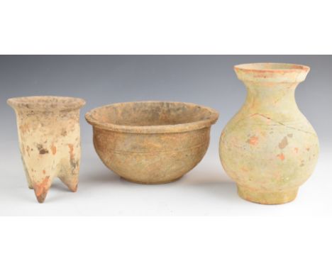 Three antique pottery vessels comprising possibly Roman, Neolithic and Chinese, tallest 28cm