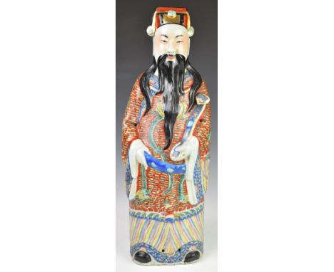 Chinese ceramic figure of a deity, in a kimono holding a ruyi, with impressed seal mark to base, height 62cm