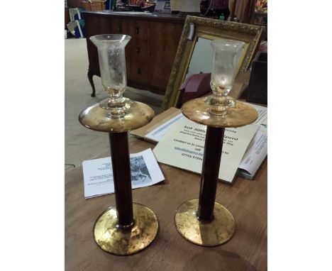 Pair of vintage glass candlesticks, with gold and brown colouring to resemble wood and brass. 30 cm high