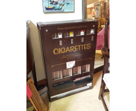 Vintage cigarette vending machine with advertising labels 58 cm wide, 88 cm tall
WE CAN SHIP THIS LOT WORLDWIDE: just ask for
