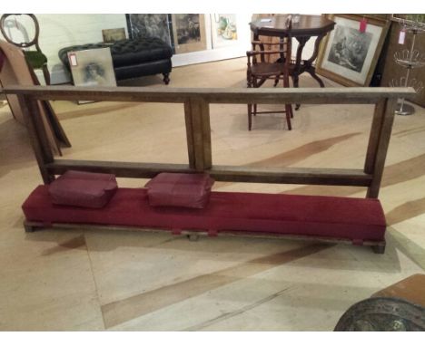 Prayer /kneeling bench, ecclesiastical item, oak with claret pad and two kneeling cushions. 214 cm long.