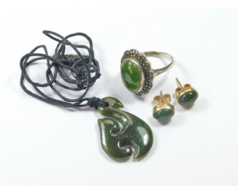 MARCASITE ETC. A silver & marcasite dress ring set a dark green jadeite stone, a pair of 9ct. gold ear studs set a similar st