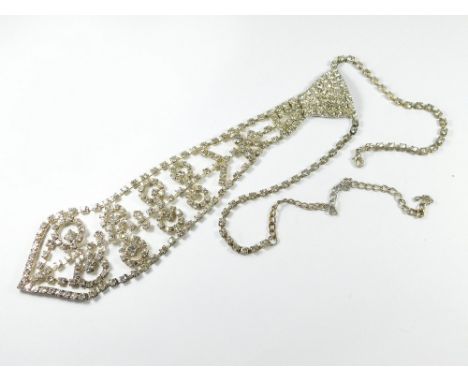 PASTE NECKLACE. A vintage paste 'necktie' necklace. Length of drop, 21.5cm.  Please note that all items in this auction are p