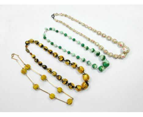 FOIL BEADS ETC. Four glass bead necklaces, including black & yellow foil beads, Murano style white beads & two necklaces with