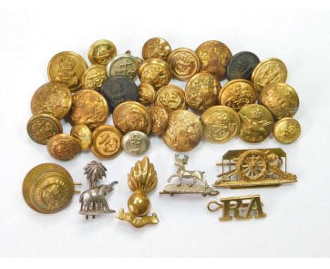 COLLAR BADGES & BUTTONS. Military collar badges including Royal Artillery & a quantity of army & naval buttons.  Please note 