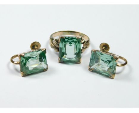 DRESS RING ETC. A 14k. dress ring set a blue-green rectangular stone, with a pair of matching earrings with screw fittings.  