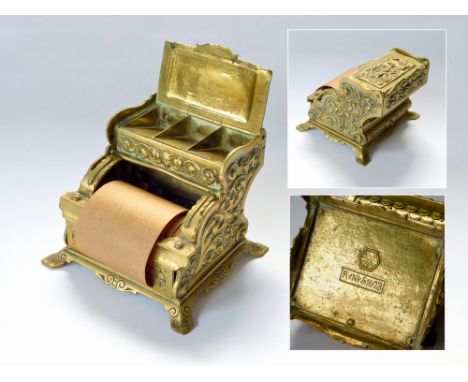STAMPS BOX/MOISTENER. A late 19th century brass 'cash register', triple-compartment stamps box, over a stamps moistener. (Lar