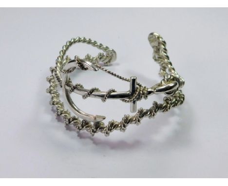 JAMES SUDDABY, A contemporary, hand-made, James Suddaby, 999 fine silver 'Anchor & Ropes' bangle. Applied naming & Birmingham