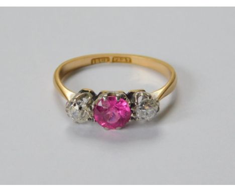 DIAMOND RING. An 18ct. gold & platinum diamond & corundum (probably synthetic) ring. Each diamond of approx. 0.25ct. spread. 