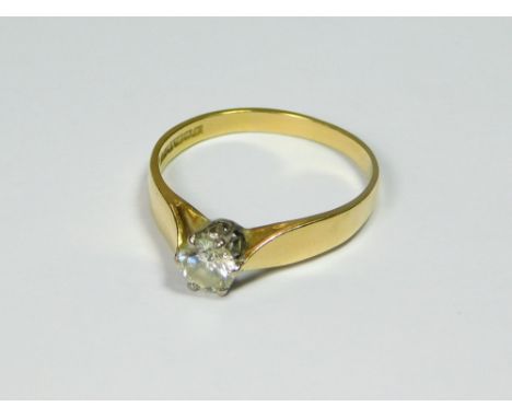 SOLITAIRE RING. An 18ct. gold solitaire diamond ring, the stone in its coronet setting of approx. 0.50ct. spread. Size O. App