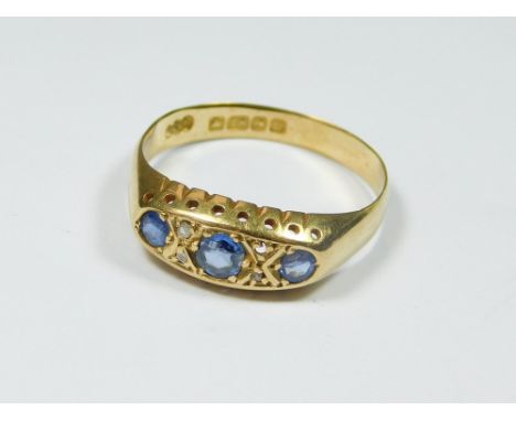 SAPPHIRE RING. An early 20th century, 18ct. gold sapphire & diamond ring. Size R. Approx. 3.3g.  Please note that all items i