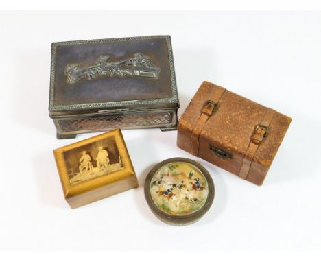 BOXES. A cigarette box, the lid with embossed Santa Claus decoration, a miniature leather covered travelling trunk, a box wit