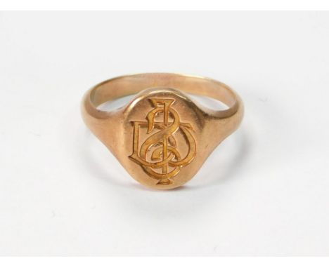SIGNET RING. An 18ct. gold signet ring with monogram. Approx. 6.7g. Size Q/R.Please note that all items in this auction are p