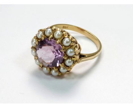 AMETHYST RING. A modern 9ct. gold amethyst & cultured pearl set ring. Size N/O. Approx. 5.2g.  Please note that all items in 