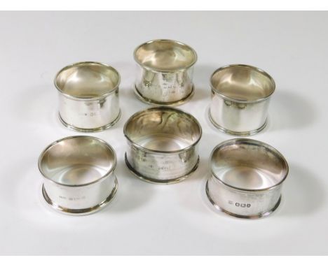 NAPKIN RINGS. Five plain napkin rings & a single engine-turned ring. Approx. 79g. (2.5 t.oz.)  Please note that all items in 
