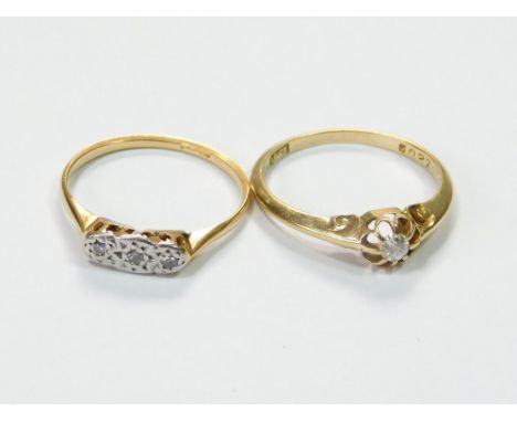 DIAMOND RINGS. An 18ct. gold solitaire diamond ring & an 18ct. gold & platinum illusion-set diamond ring.  Please note that a