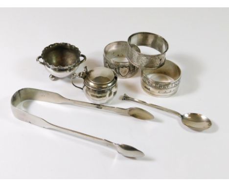 NAPKIN RINGS ETC. A Victorian foliate-engraved silver napkin ring; a 1937 Iraqi silver & niello napkin ring, inscribed & a ca