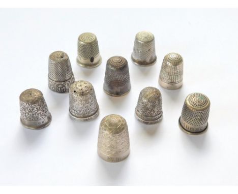 THIMBLES. Four hallmarked silver thimbles & seven other various thimbles, including advertising.  Please note: Middle front r