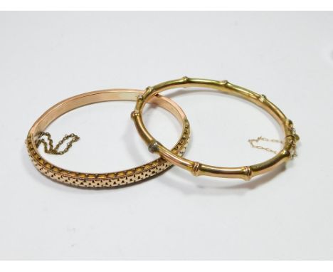 GOLD BANGLE ETC. A 9ct. gold faux bamboo-style bangle, approx. 6.6g. Also, a gold plated bangle.  Please note that all items 