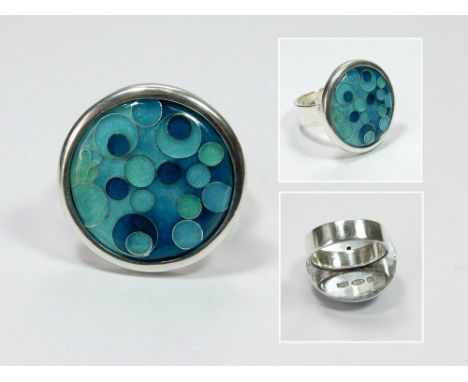 JAMES &amp; SAMANTHA SUDDABY. A contemporary, hand-made 'Bubbles In Ice' ring by James Suddaby in 999 fine silver &amp; with 