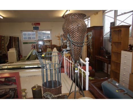 A wirework stick stand together with a similar plant stand 