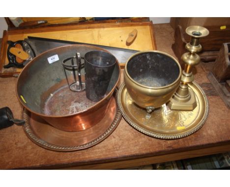 A quantity of metalware to include a copper jardiniere; a Victorian brass candle stick; trays etc