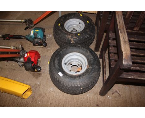 A pair of garden tractor wheels and tyres 