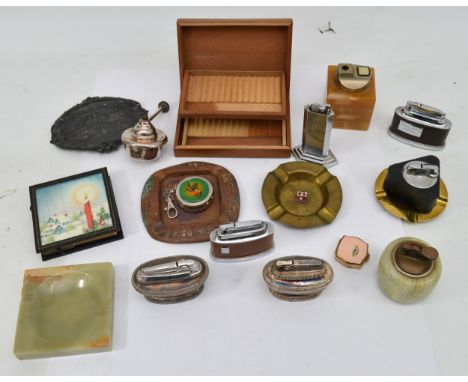 A collection of mid 20th century smokerama collectables, to include Ronson and Mc Murdo table cigarette lighters, onyx table 