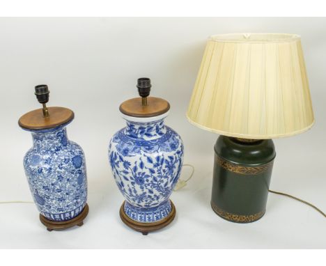LAMPS, three, two Chinese blue and white with wood mounts and a green and gilt toleware lamp with silk shade, tallest 50cm H.