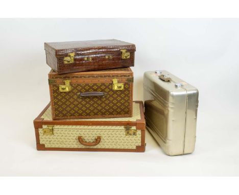 SUITCASES, four, including a Juschi suitcase, a vintage zero halliburton aluminium case, a Joseph Braman trunk and a mid 20th