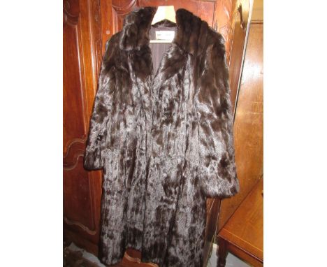 Ladies three quarter length dark brown mink fur coat by Thorpe and Crump Limited, Croydon, together with a similar mid brown 
