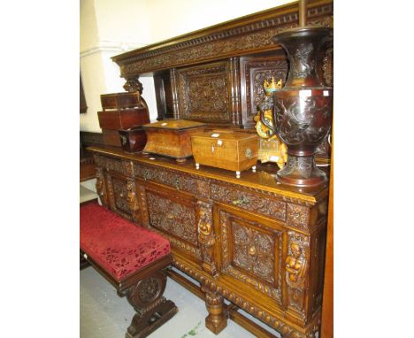 Large good quality early 20th Century carved oak sideboard, the canopy back on gryphon supports above three drawers and three