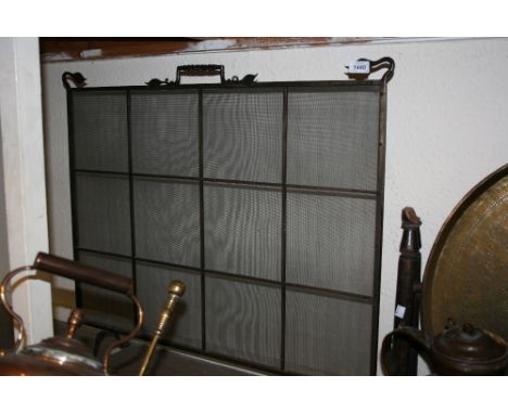 Wrought iron fire screen
