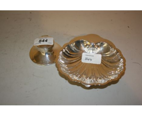 Silver shell form trinket dish and a silver capstan inkwell