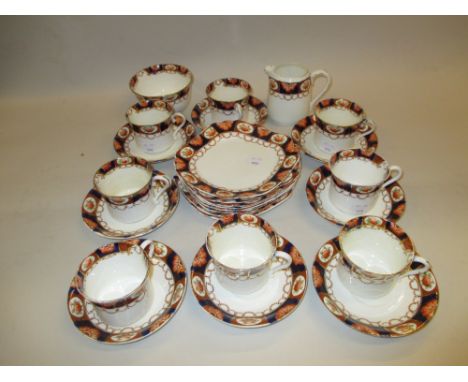 Early 20th Century tea service decorated in iron red, blue and gilt