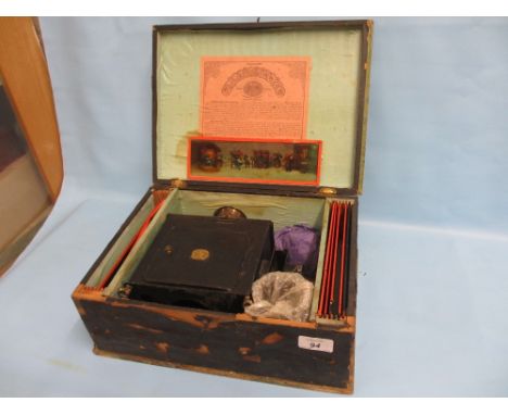 19th Century German tin plate magic lantern with slides in original box