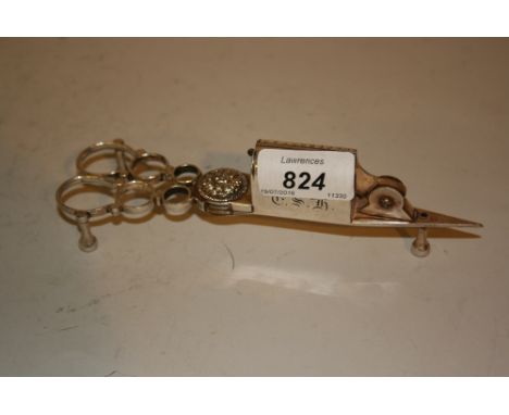 Pair of 19th Century silver plated patent candle snuffers marked Paul Storr