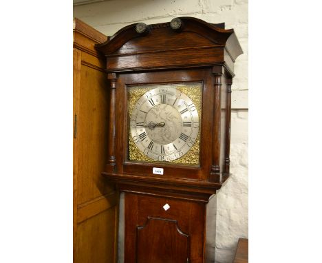 George III oak longcase clock, the square hood with flanking pilasters above a shaped panelled door and conforming plinth bas