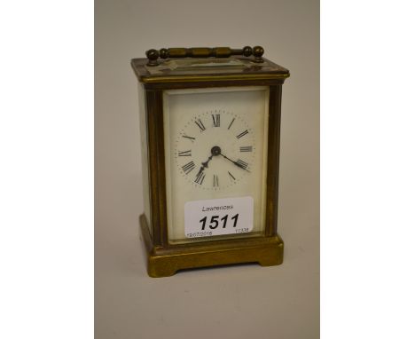 20th Century gilt brass carriage clock, having enamel dial with Roman numerals (including winding key)