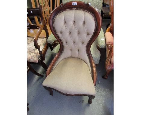 20th Century low seat button back nursing chair on cabriole supports