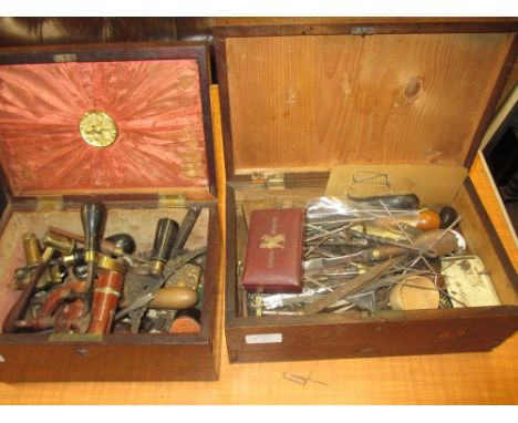 Two boxes containing a quantity of vintage gunsmith and watchmakers tools