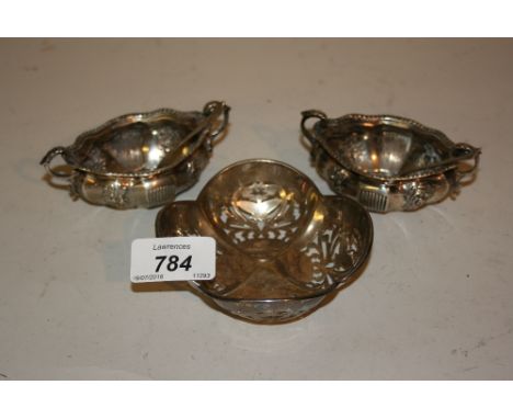 Pair of Birmingham silver floral embossed two handled salts with spoons and a Birmingham silver lobed and pierced trinket dis