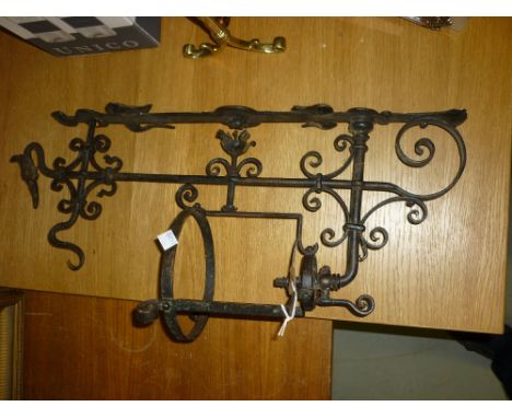 Pair of Arts and Crafts wrought iron gas light wall brackets with bird surmounts
