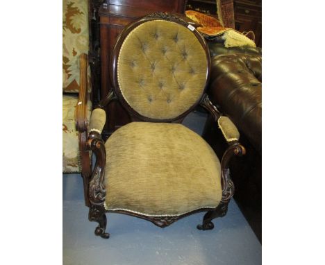 Pair of Victorian mahogany ladies and gentlemens spoon back chairs, having button back upholstery and carved cabriole front s