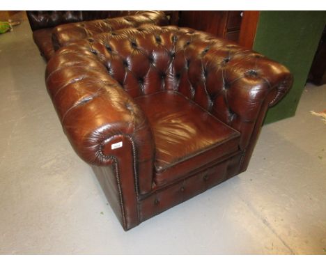 20th Century brown leather button upholstered armchair with loose cushion