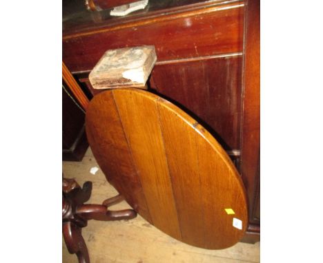 Mid 18th Century oak circular pedestal table with a turned tapering column support and tripod base