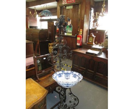 Unusual 19th Century Continental wrought iron bowl stand of ornate pierced floral design on a tripod base