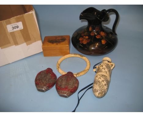 Oriental carved bone perfume bottle, two 20th Century carved red cinnabar snuff bottles, a Mauchline ware box and a bangle to